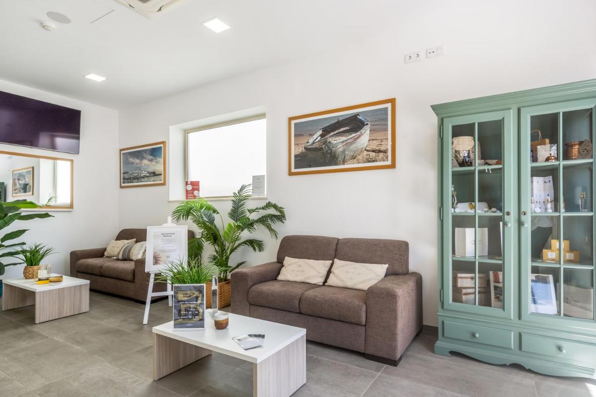 Uma área de estar em Hotel Rural Brícia Du Mar
