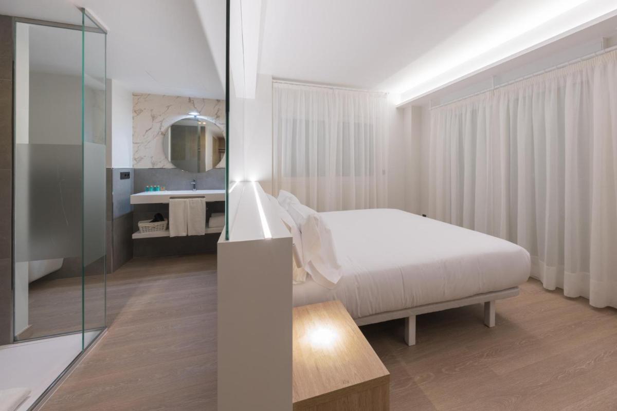 Cama o camas de una habitación en Hotel Spa Meiga do Mar