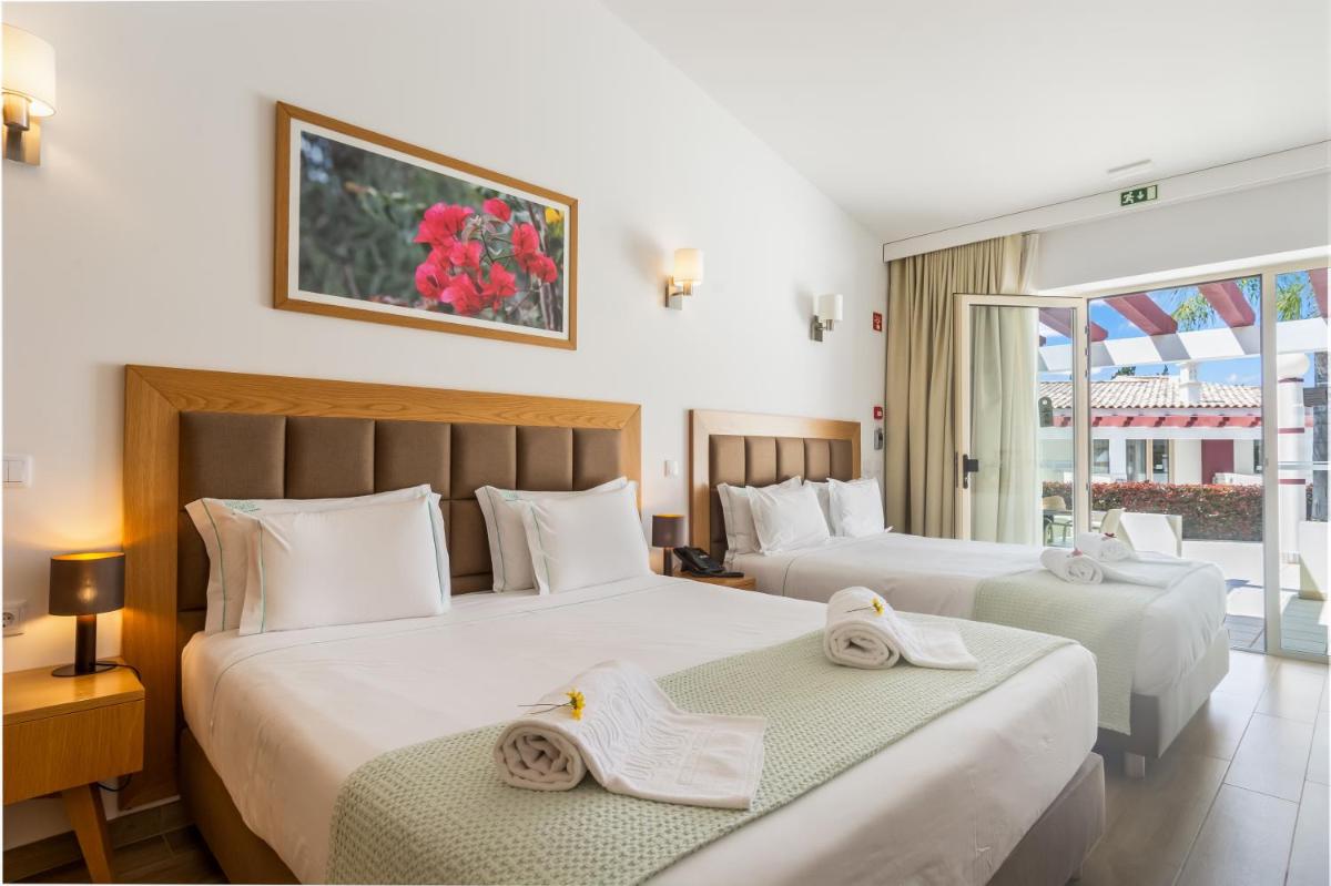 Uma cama ou camas num quarto em Hotel Rural Brícia Du Mar