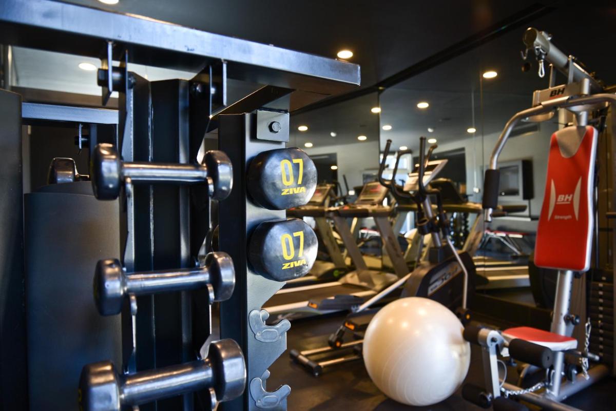 O centro de fitness e/ou as comodidades de fitness de Evidencia Belverde Hotel