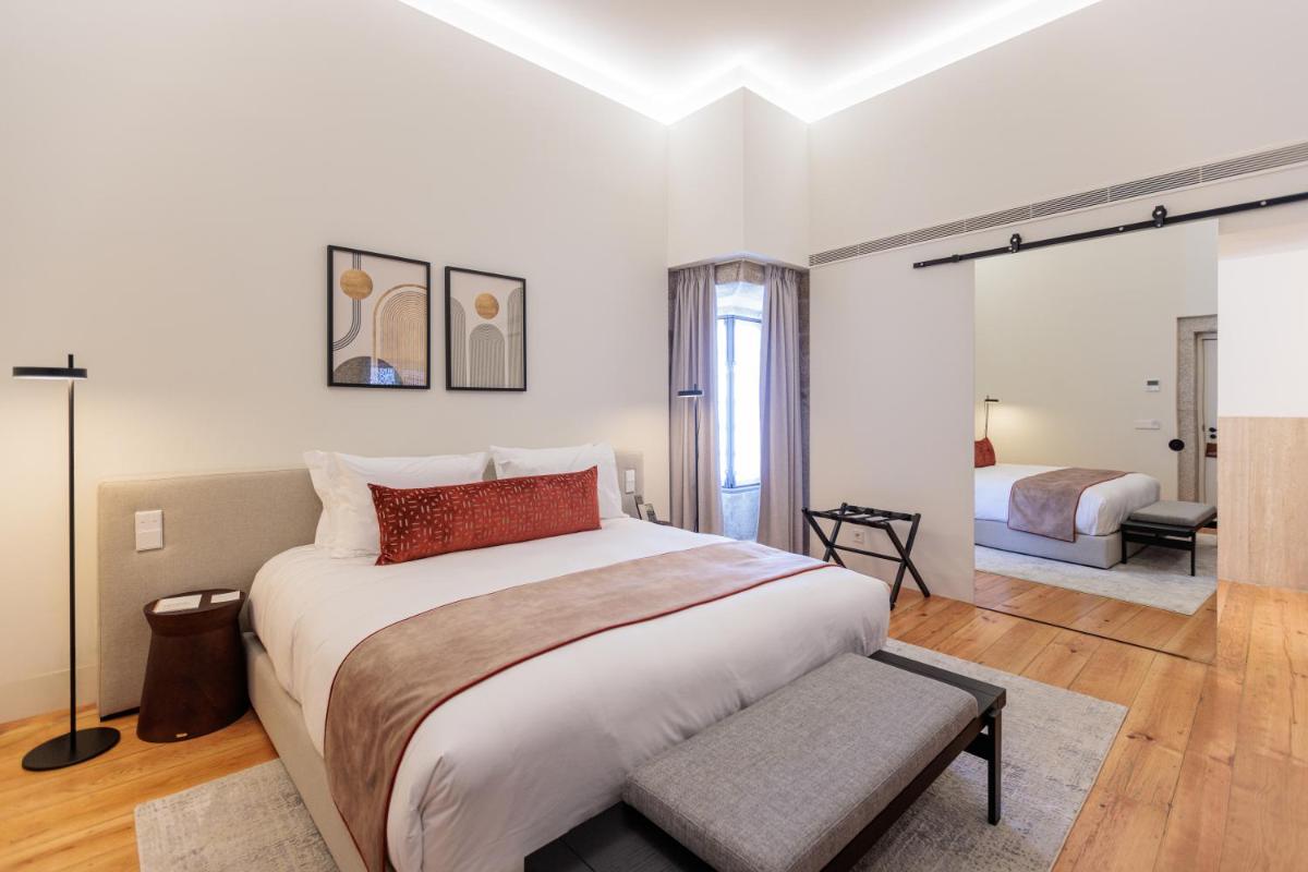 Uma cama ou camas num quarto em MS Collection Arouca - Mosteiro de Arouca