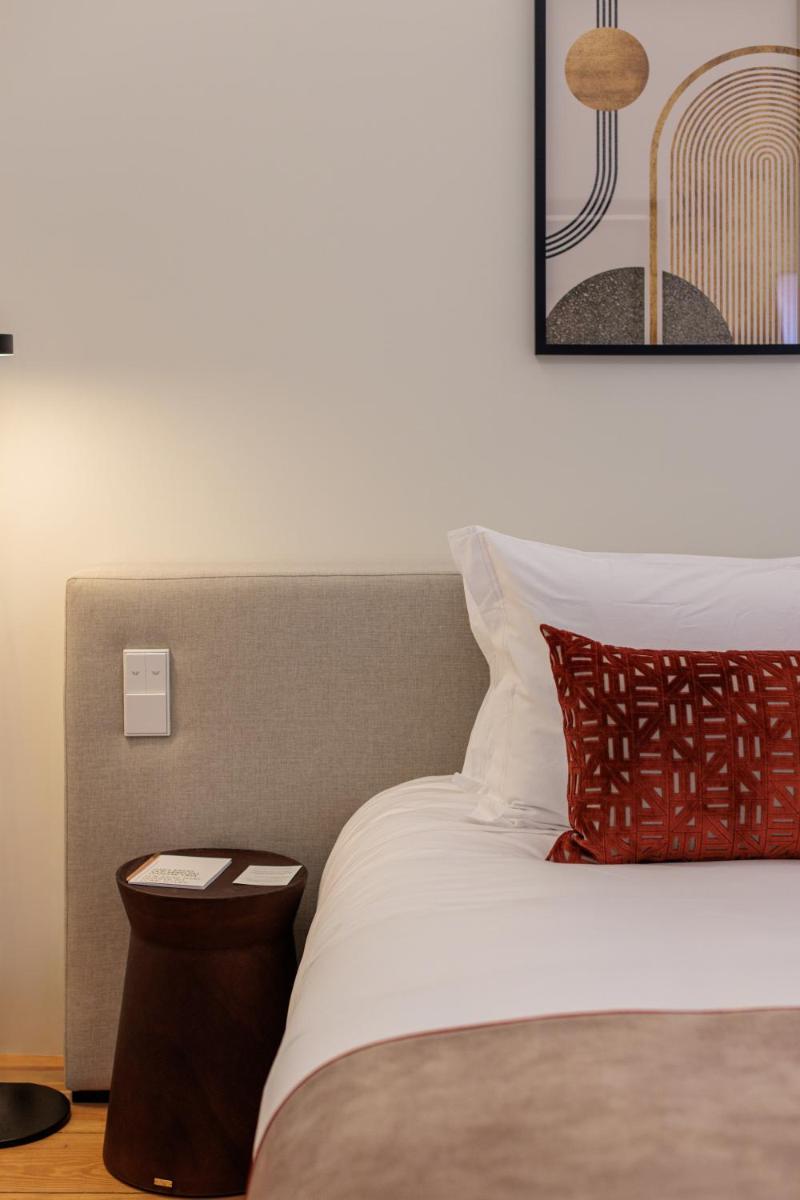 Uma cama ou camas num quarto em MS Collection Arouca - Mosteiro de Arouca