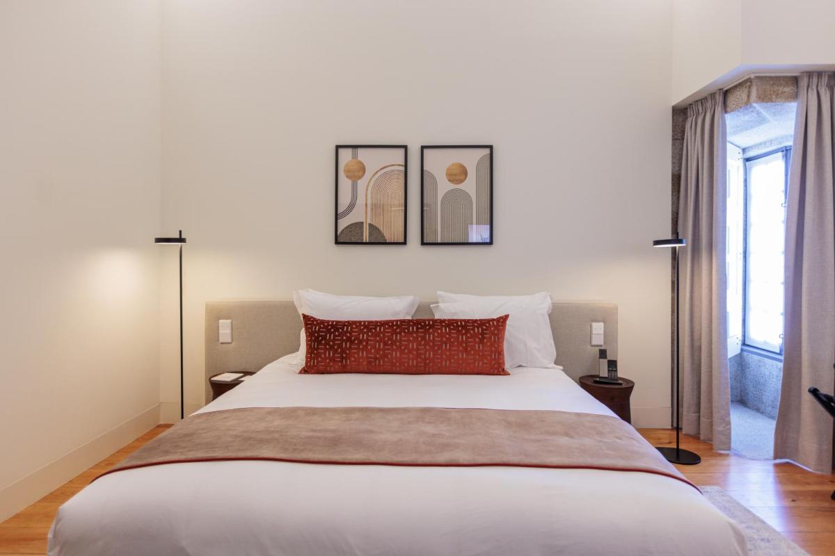 Uma cama ou camas num quarto em MS Collection Arouca - Mosteiro de Arouca
