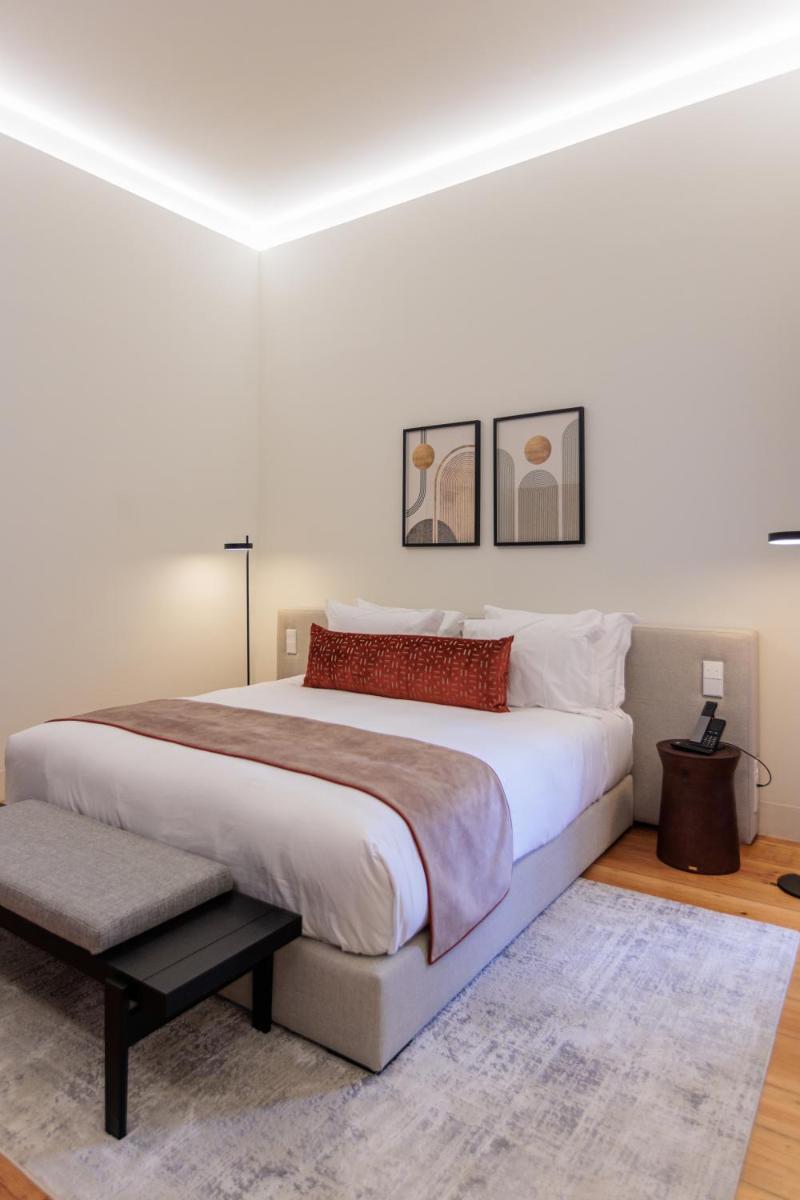 Uma cama ou camas num quarto em MS Collection Arouca - Mosteiro de Arouca