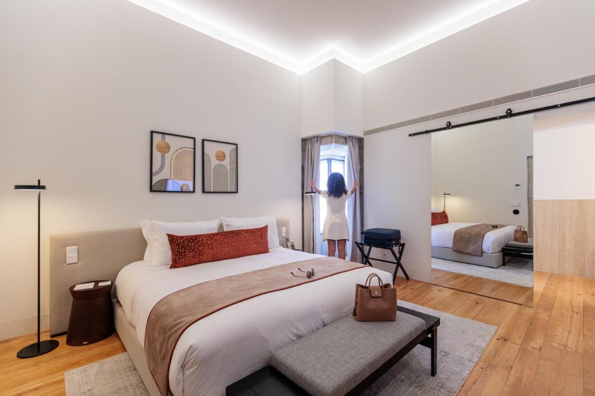 Uma cama ou camas num quarto em MS Collection Arouca - Mosteiro de Arouca