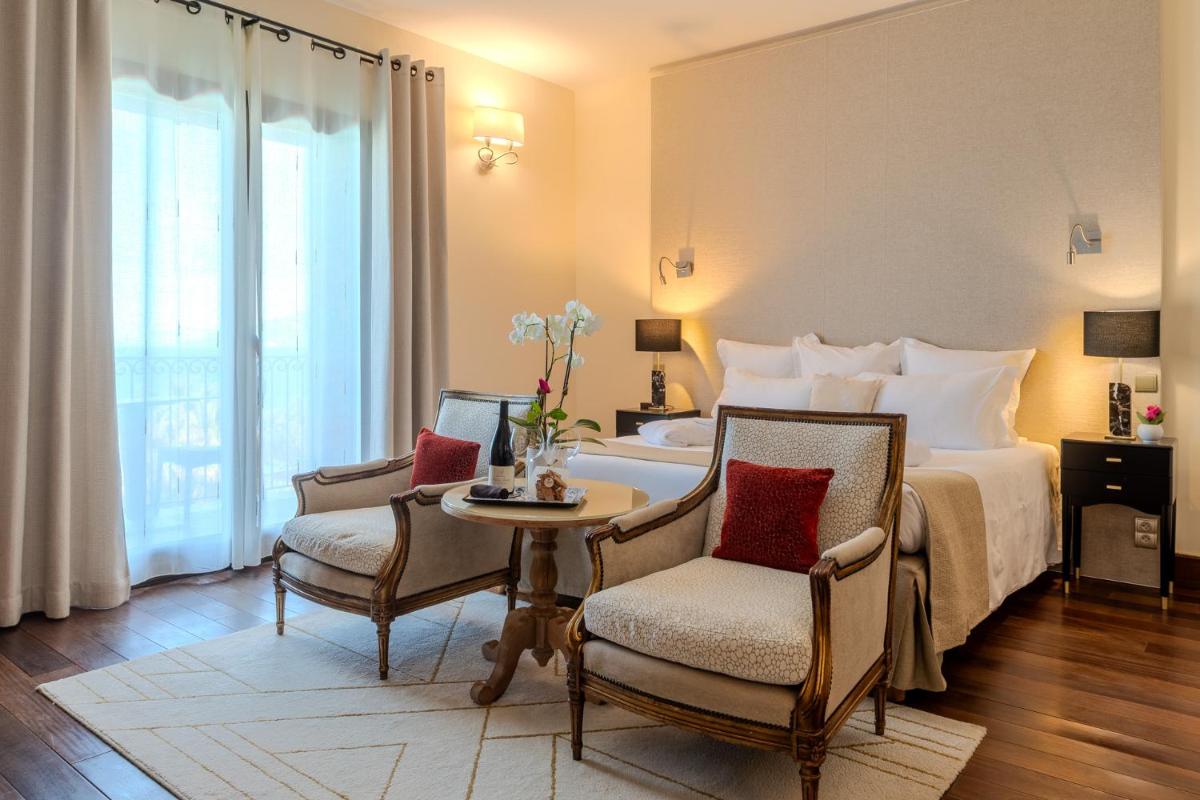Coin salon dans l'établissement Hôtel Demeure Loredana Coin salon dans l'établissement Hôtel Demeure Loredana