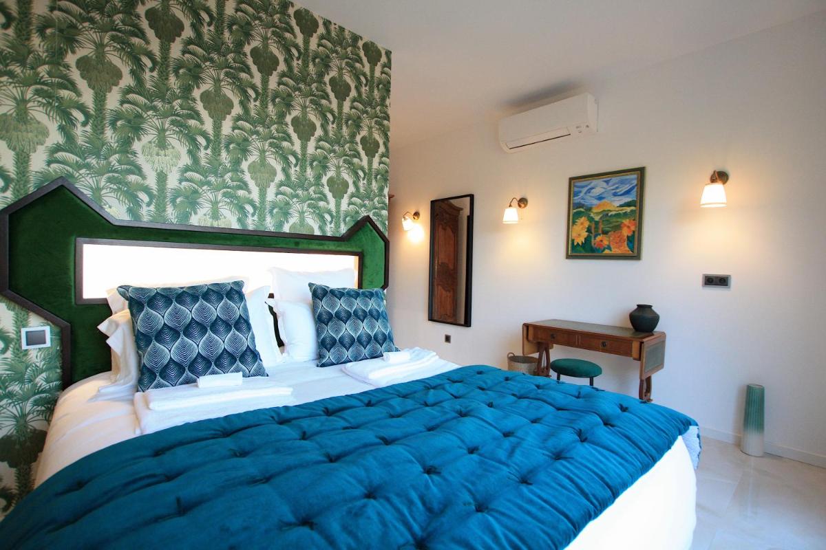 Un ou plusieurs lits dans un hébergement de l'établissement Hotel Minera