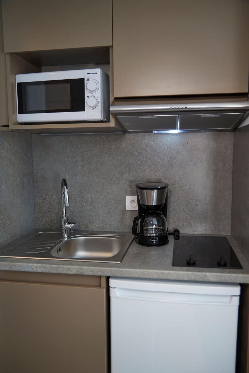 Cuisine ou kitchenette dans l'établissement Pure Thermal Residence