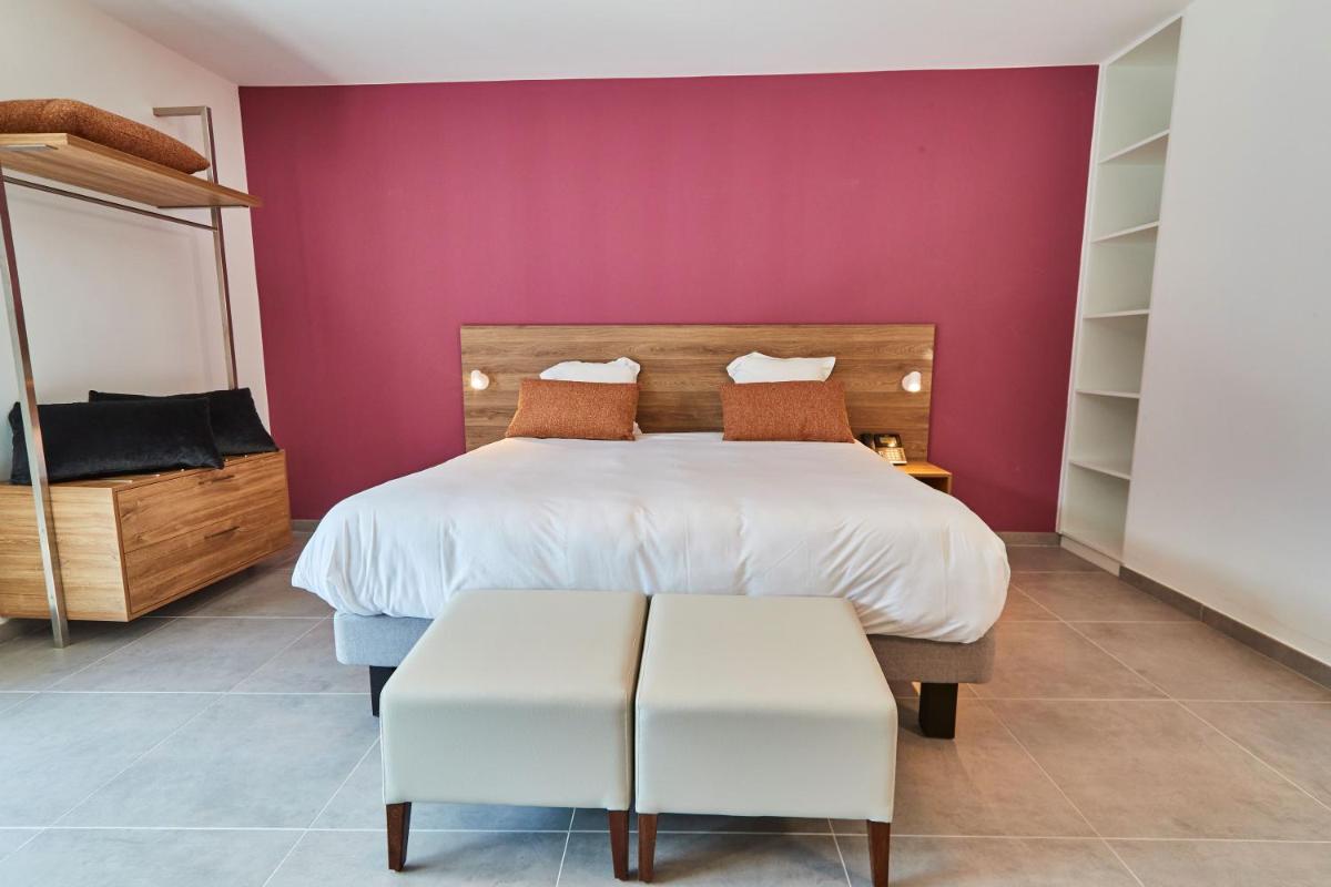 Un ou plusieurs lits dans un hébergement de l'établissement Pure Thermal Residence