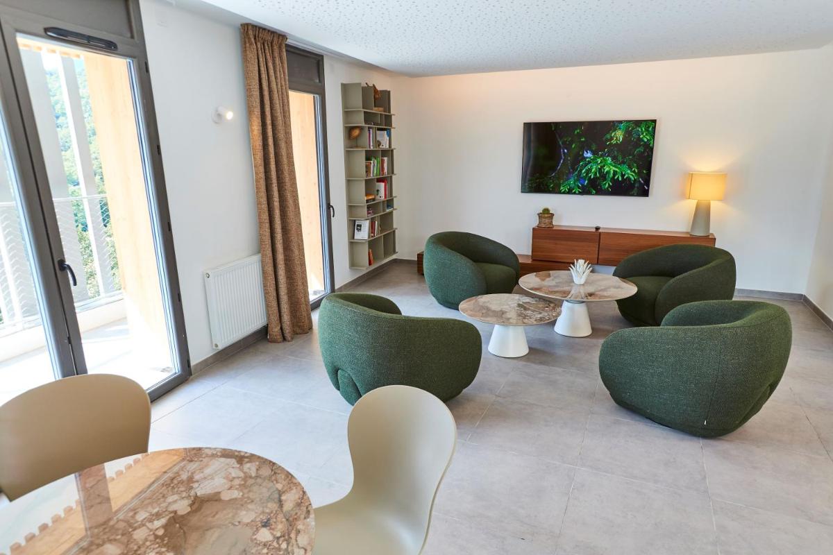 Coin salon dans l'établissement Pure Thermal Residence