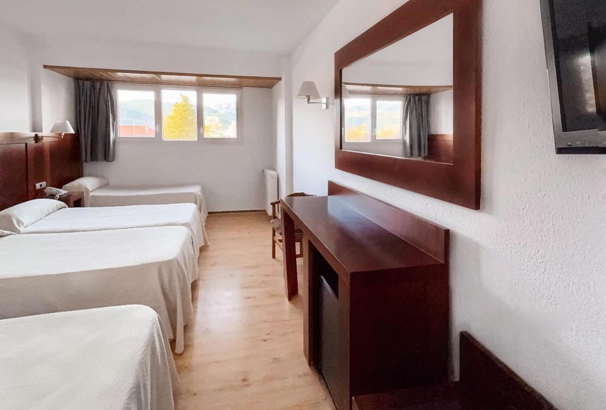 Cama o camas de una habitación en Puigcerda Park Hotel