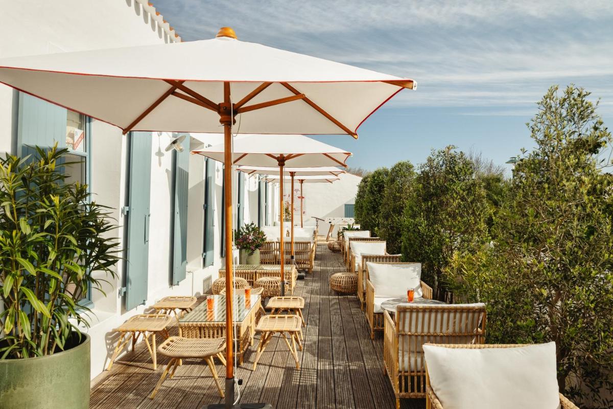 Balcon ou terrasse dans l'établissement La Mission Hôtel & SPA - l'île d'Yeu