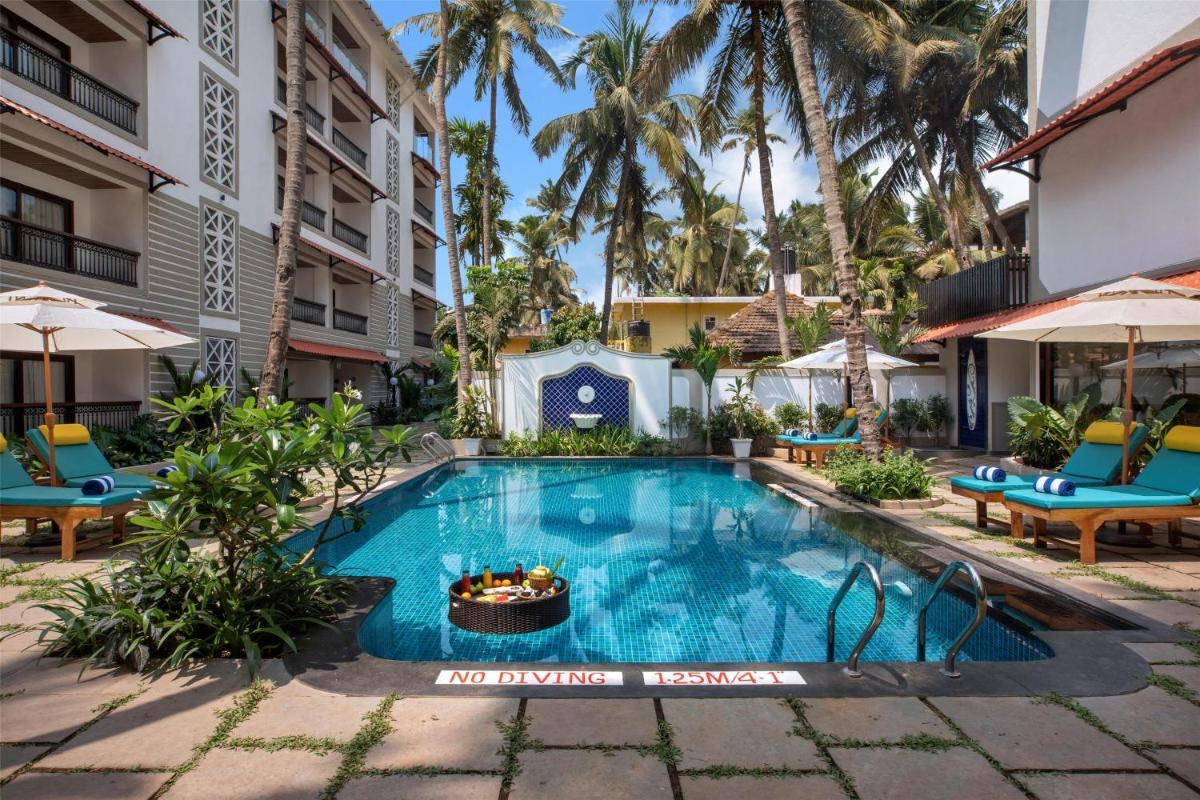 an image of a swimming pool at a hotel at Radisson Goa Candolim in Candolim