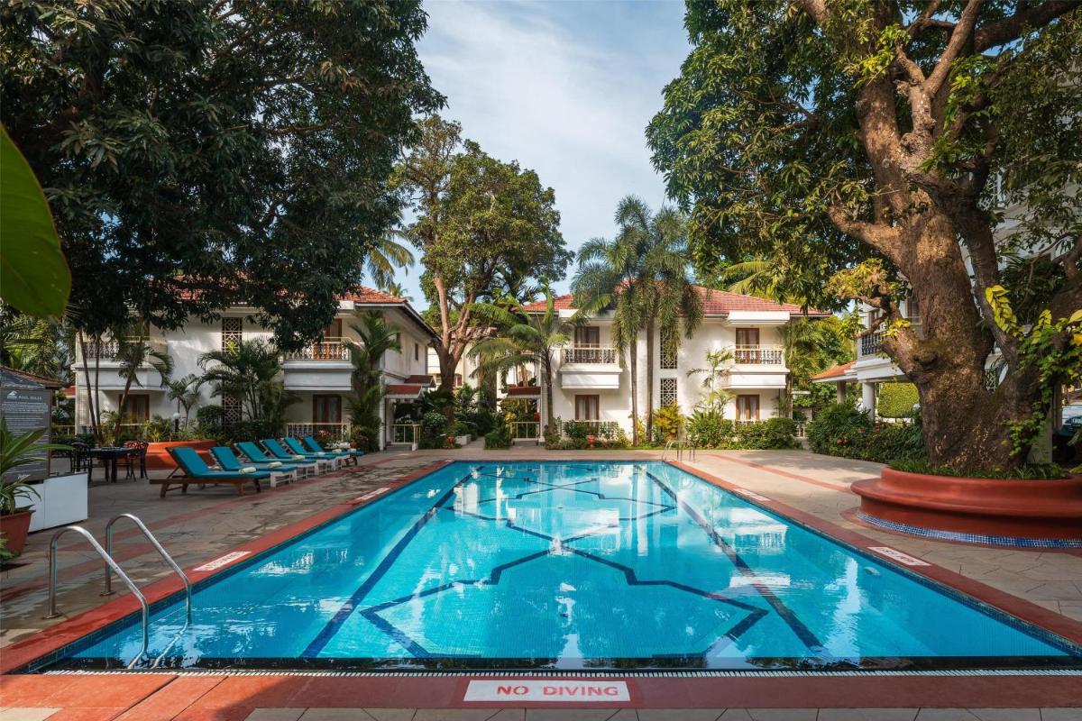 an image of a swimming pool at a hotel at Radisson Goa Candolim in Candolim