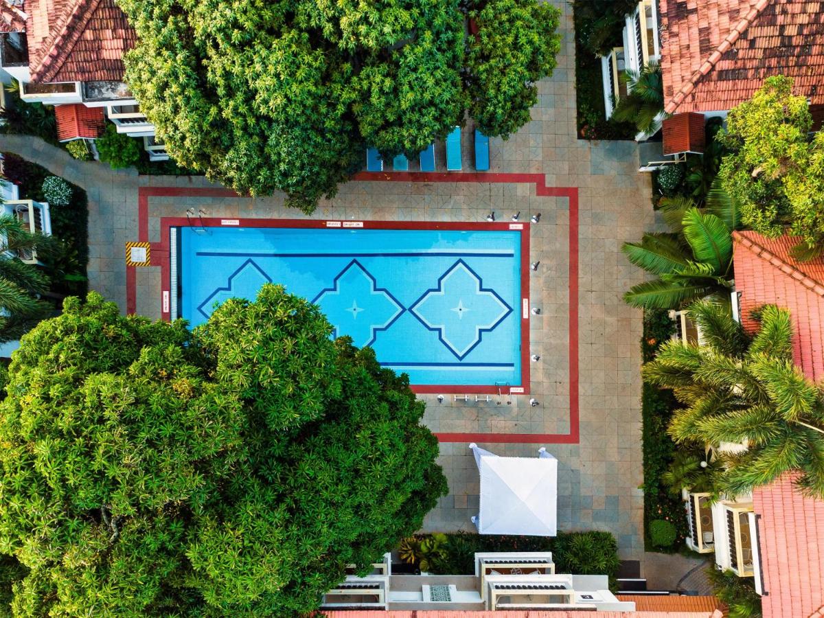 an overhead view of a pool with a star painted on it at Radisson Goa Candolim in Candolim