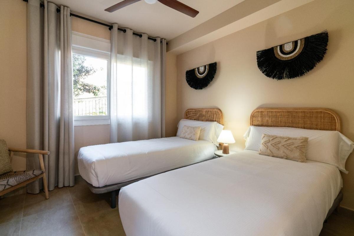 Cama o camas de una habitación en Hotel Ritual de Terra & SPA Moraira