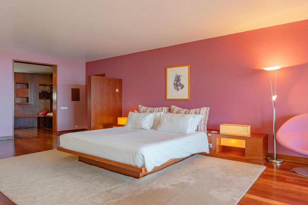 Uma cama ou camas num quarto em Quinta Splendida Wellness & Botanical Garden