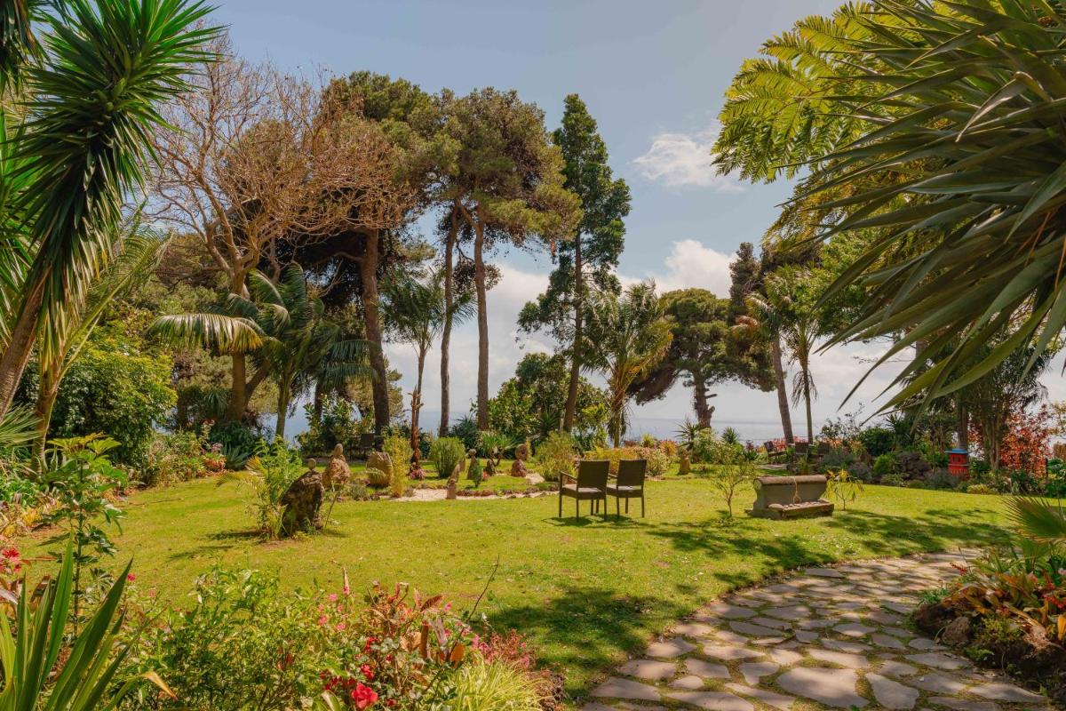 Um jardim no exterior de Quinta Splendida Wellness & Botanical Garden