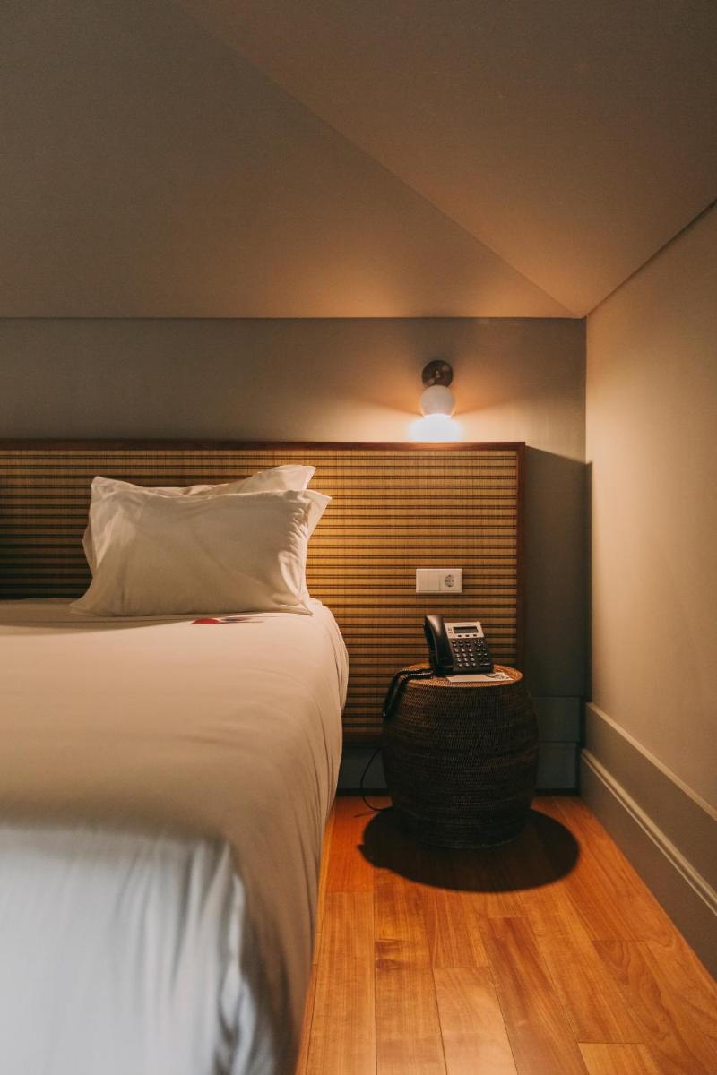 Uma cama ou camas num quarto em Torel Saboaria