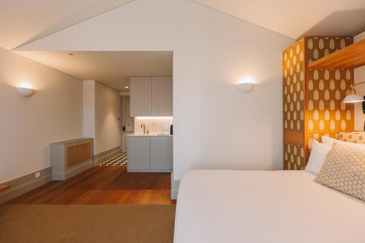 Uma cama ou camas num quarto em Torel Saboaria