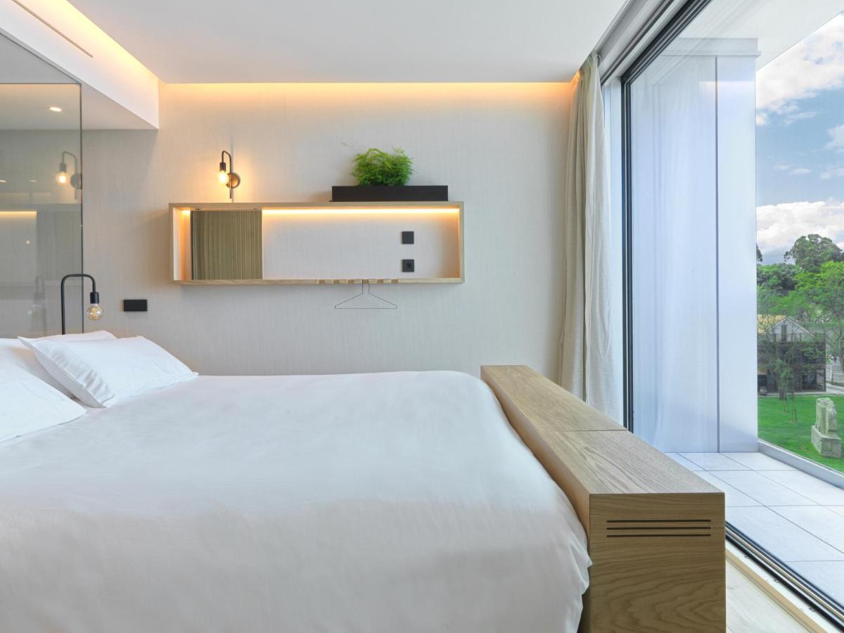 Cama o camas de una habitación en Noa Boutique Hotel
