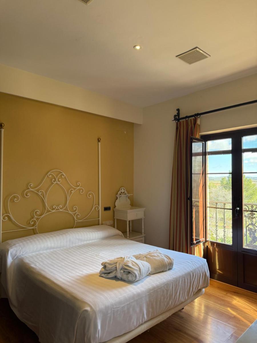 Cama o camas de una habitación en Balneario Cervantes