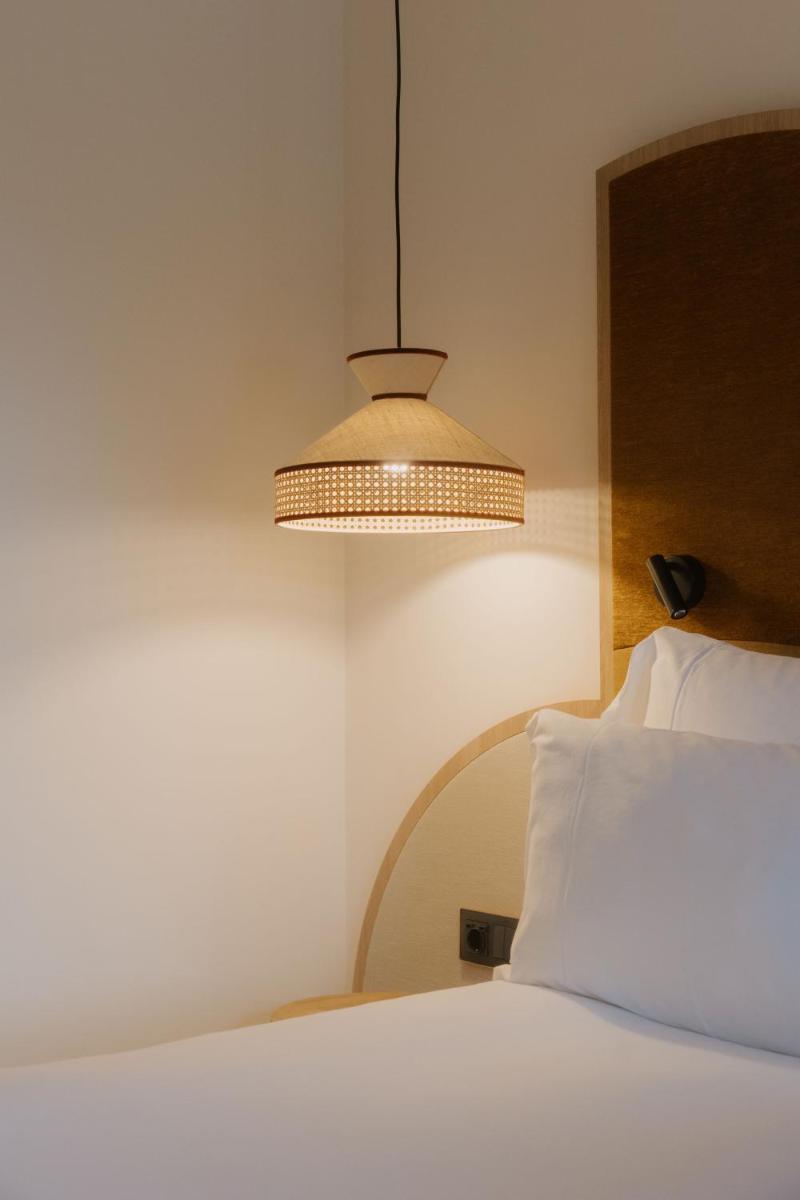 Cama o camas de una habitación en SO/ Sotogrande Spa & Golf Resort Hotel