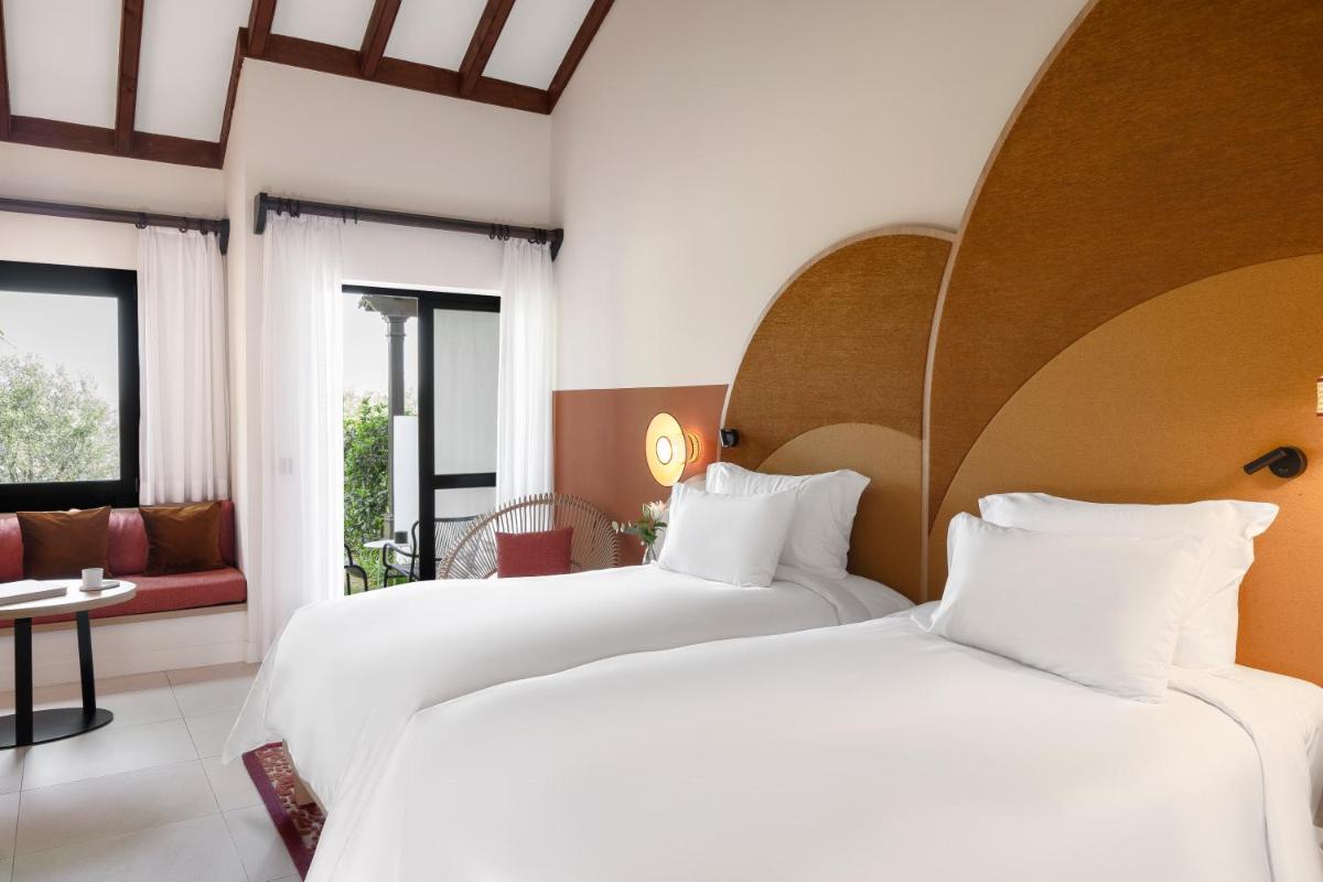 Cama o camas de una habitación en SO/ Sotogrande Spa & Golf Resort Hotel