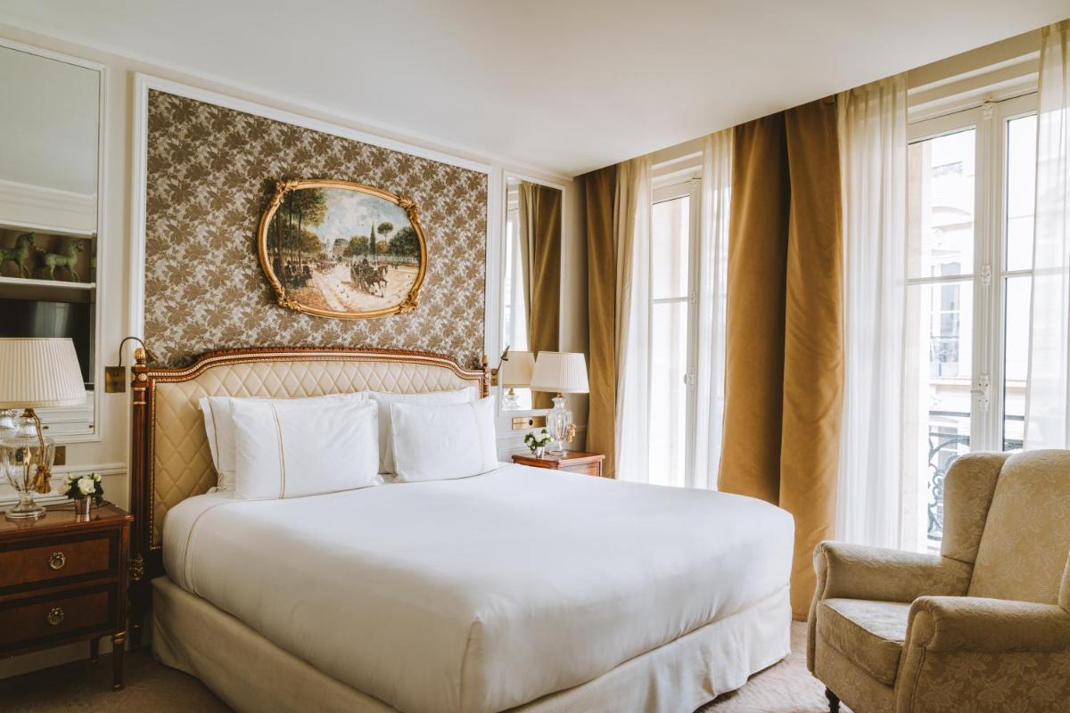 Un ou plusieurs lits dans un hébergement de l'établissement Hotel Splendide Royal Paris - Relais & Châteaux