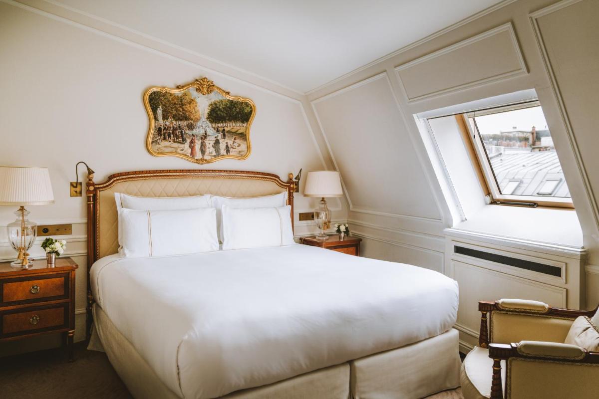Un ou plusieurs lits dans un hébergement de l'établissement Hotel Splendide Royal Paris - Relais & Châteaux