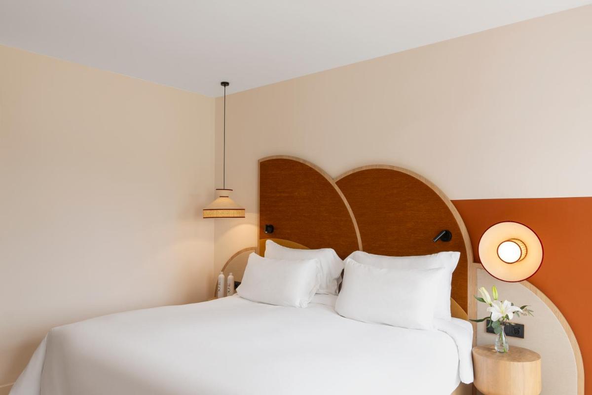 Cama o camas de una habitación en SO/ Sotogrande Spa & Golf Resort Hotel