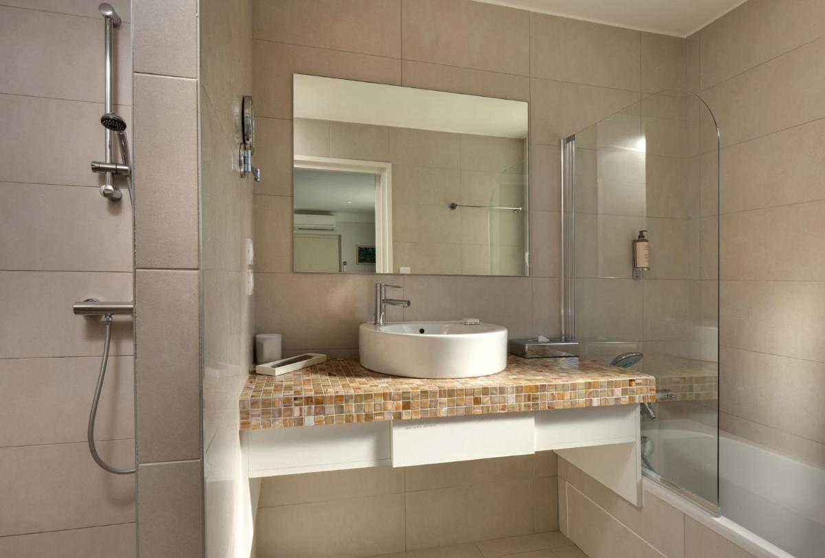 Salle de bains dans l'établissement Le Cottage - Hotel & Spa