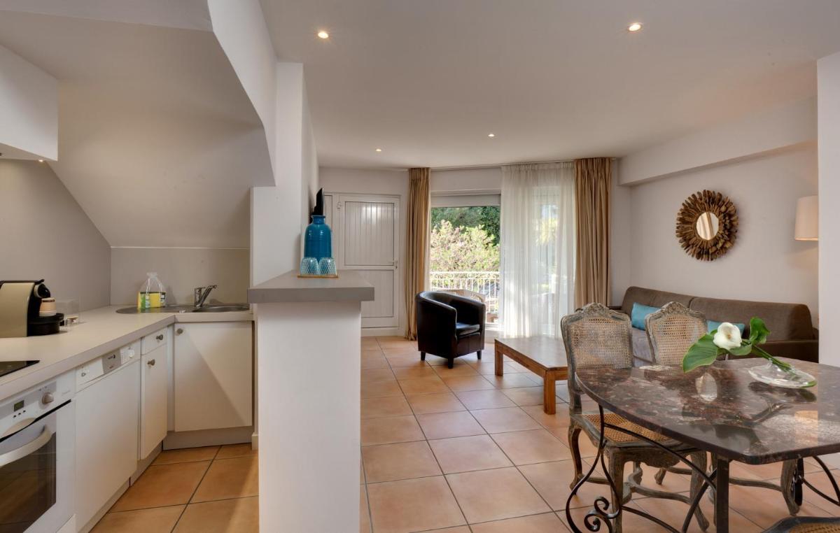Cuisine ou kitchenette dans l'établissement Le Cottage - Hotel & Spa