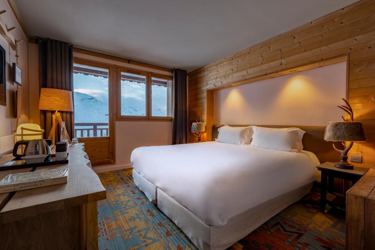 Un ou plusieurs lits dans un hébergement de l'établissement Chalet Hotel Kaya