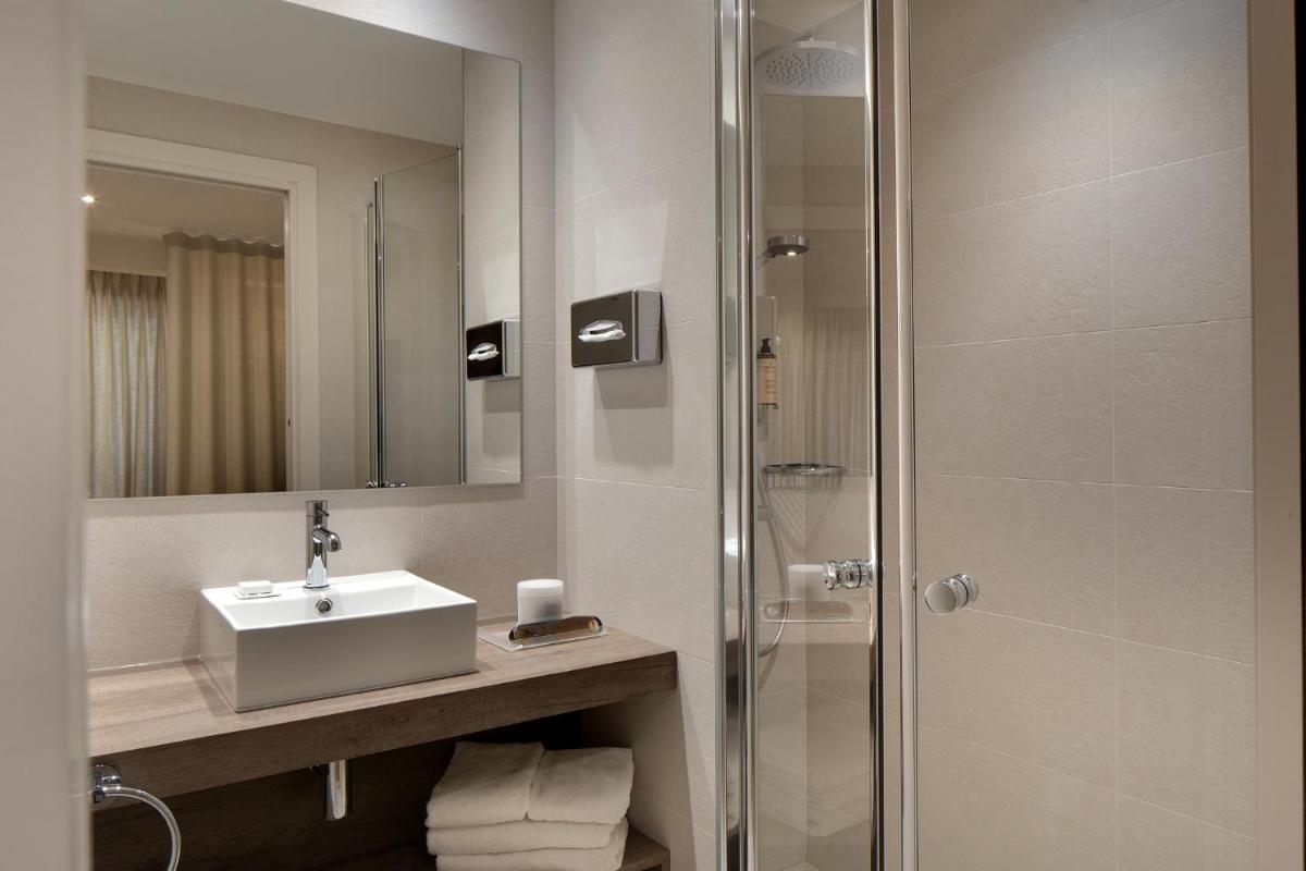Salle de bains dans l'établissement Le Cottage - Hotel & Spa