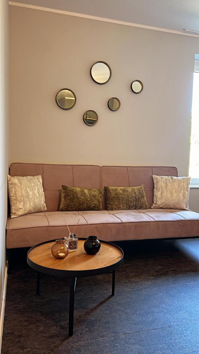 Ein Sitzbereich in der Unterkunft Motel Hasetal