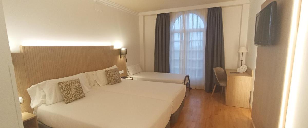Cama o camas de una habitación en Hotel Silken Villa de Laguardia