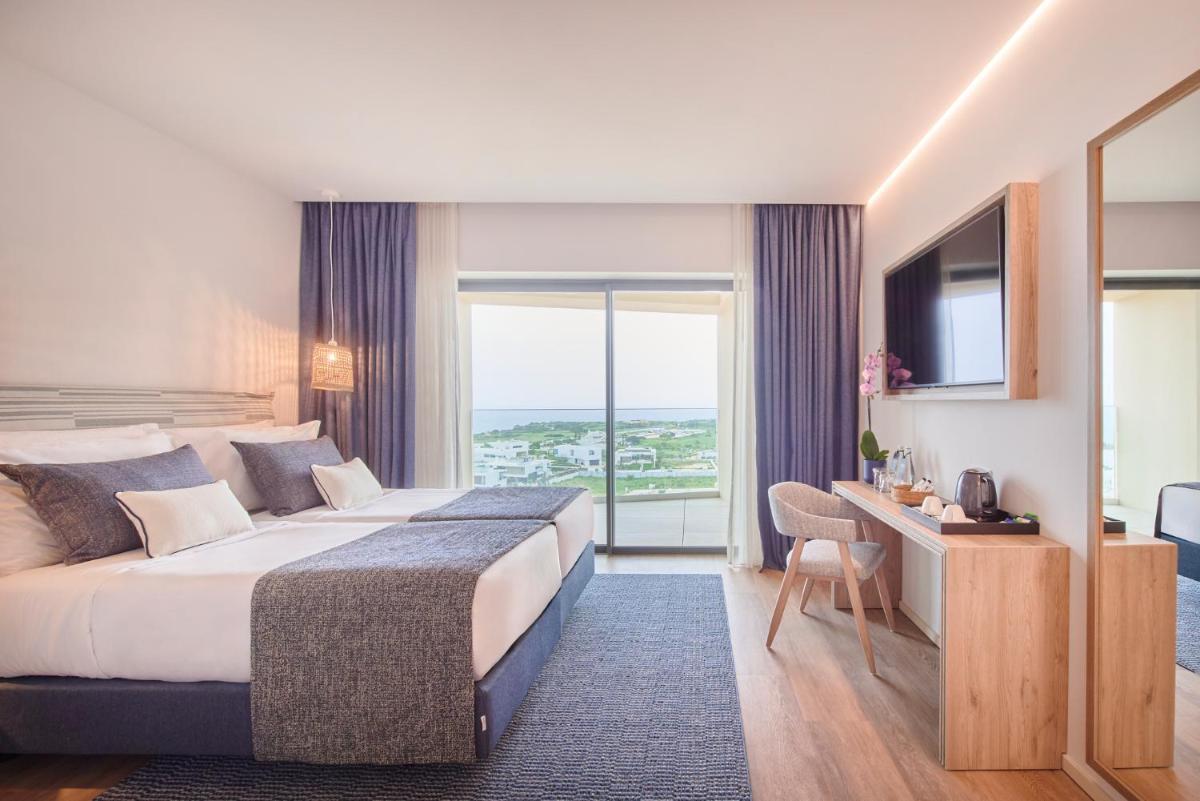 Uma cama ou camas num quarto em The Editory by the Sea Lagos