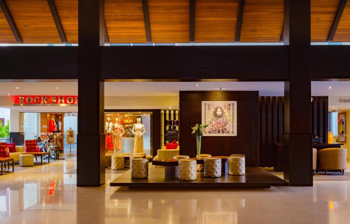 a lobby of a shopping mall with a store at Hard Rock Hotel Goa Calangute in Calangute