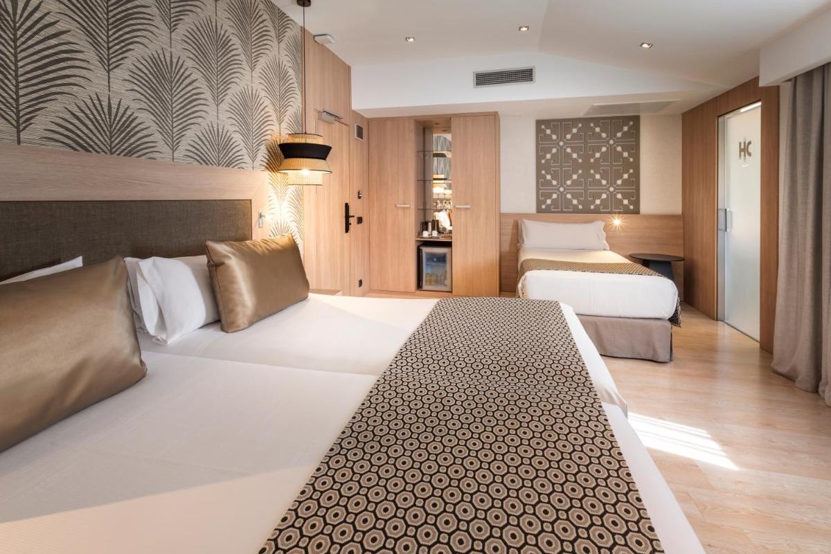 Cama o camas de una habitación en Catalonia Atocha