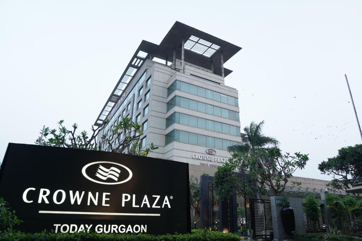 a sign in front of a building at Crowne Plaza Today Gurugram by IHG in Gurgaon