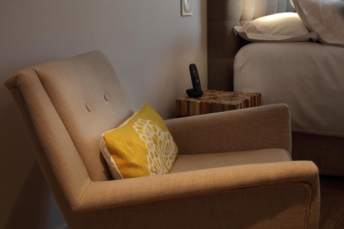 Coin salon dans l'établissement Petit Hôtel Confidentiel