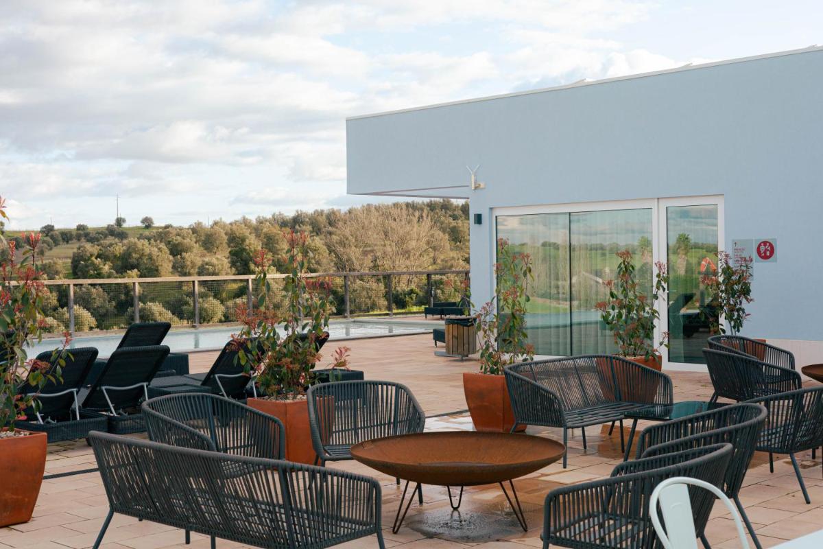 Uma varanda ou terraço em Sleep & Nature Hotel