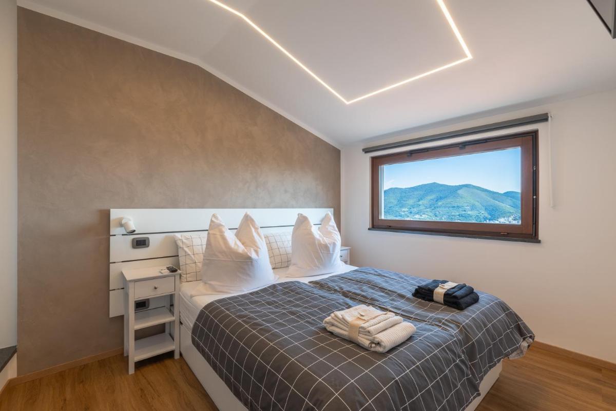 Spettacolare vista isola Terrazza e idromassaggio - Housity