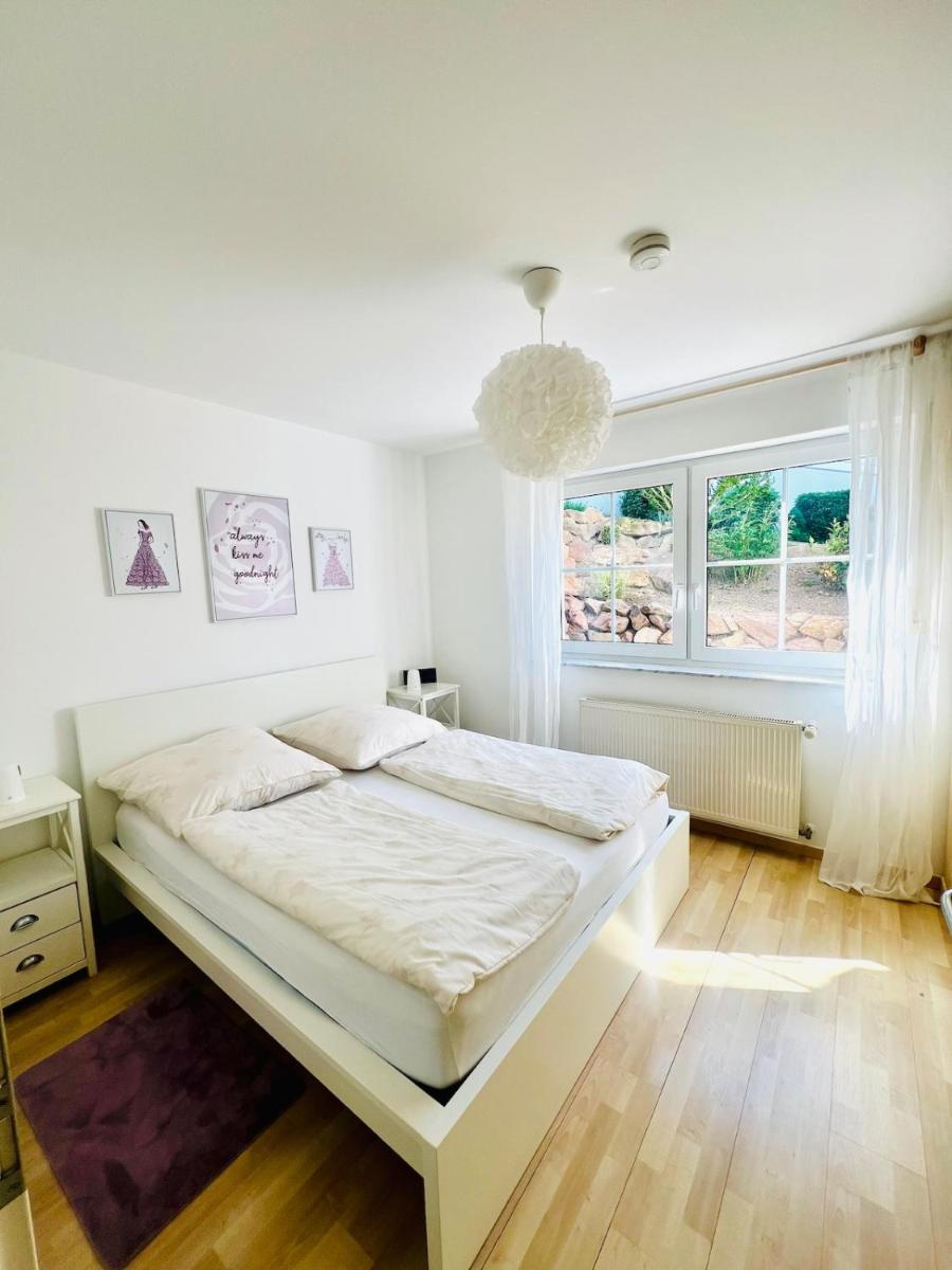 Moderne & gemütliche Ferienwohnung mit Terasse in Nieder-Olm - Housity