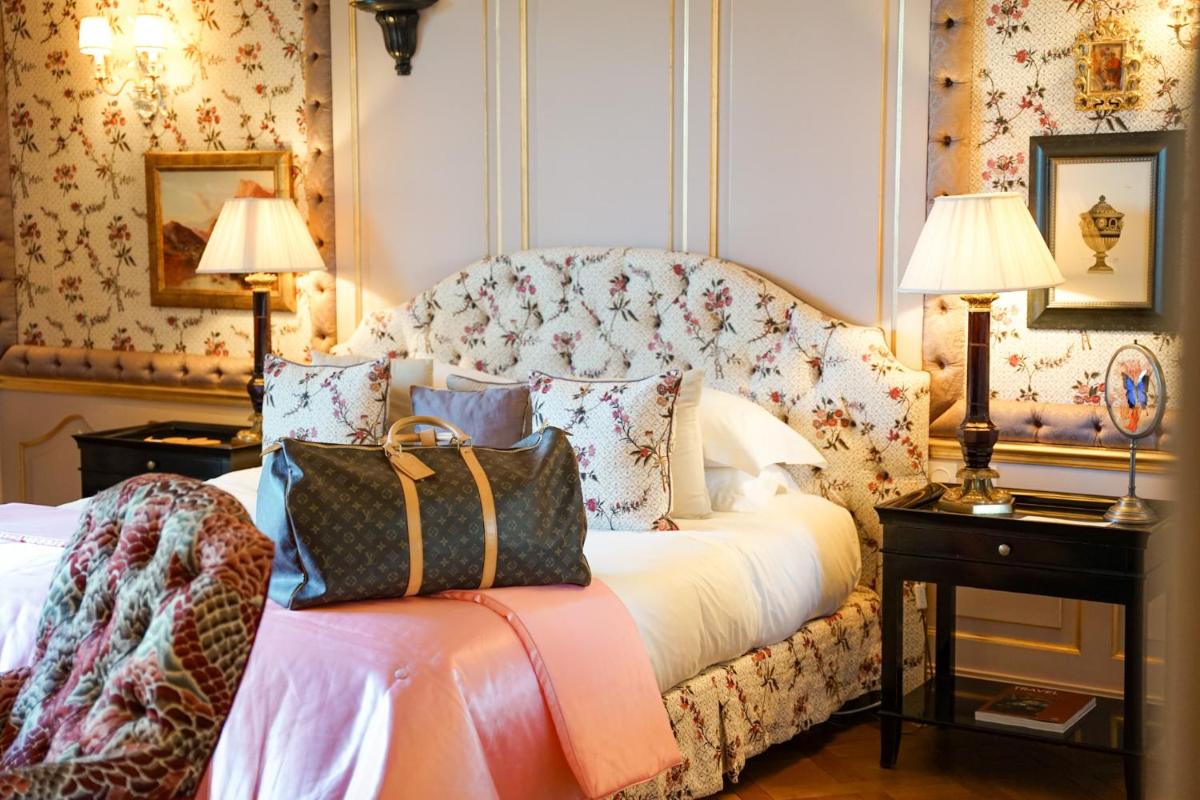 Un ou plusieurs lits dans un hébergement de l'établissement Villa Gallici Hôtel & Spa