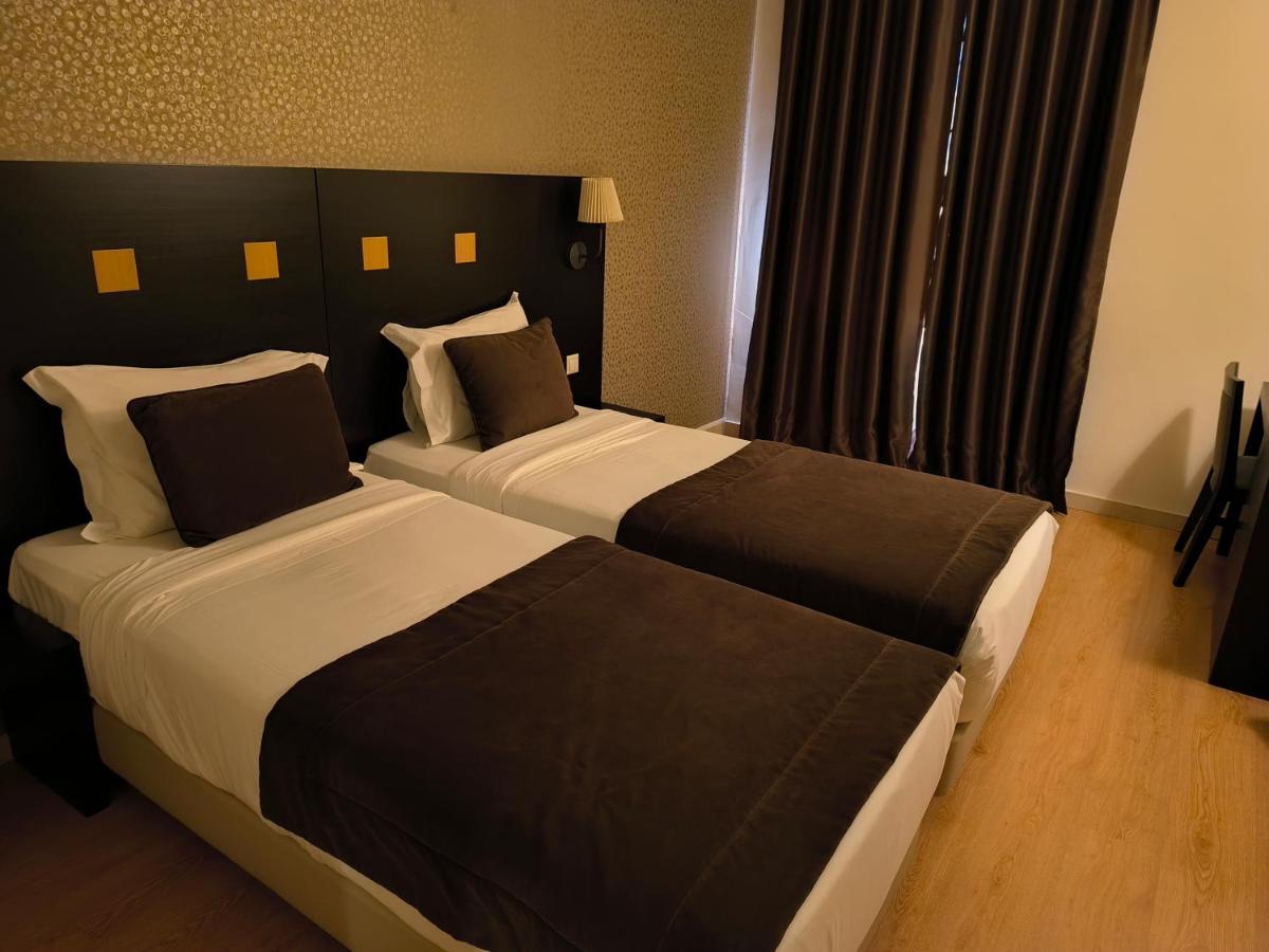 Uma cama ou camas num quarto em Douro Marina Hotel & SPA