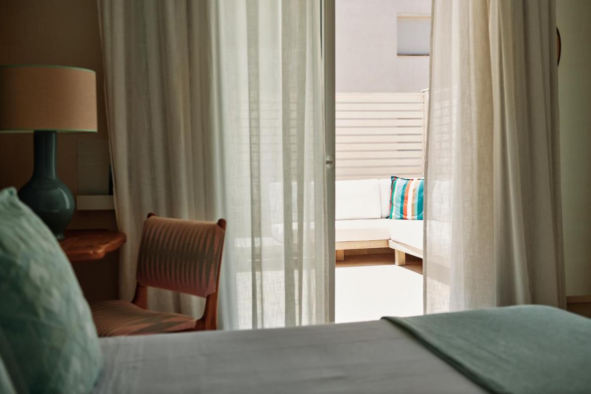 Cama o camas de una habitación en Hotel Honucai