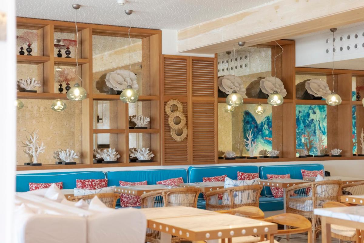 Un restaurante o sitio para comer en Hotel Honucai