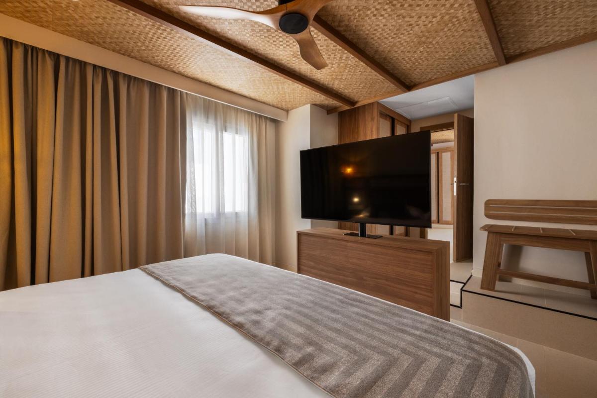 Cama o camas de una habitación en Hotel Riu Palace La Mola